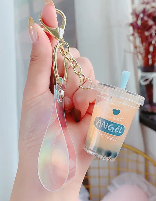 Load image into Gallery viewer, Creative Floating Unicorn Milk Tea Cup Bottle Keychain Cute Fruit Daisy Cat Bubble Tea Quicksand Sequins Liquid Car Keys Chain
