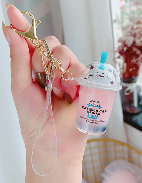 Load image into Gallery viewer, Creative Floating Unicorn Milk Tea Cup Bottle Keychain Cute Fruit Daisy Cat Bubble Tea Quicksand Sequins Liquid Car Keys Chain
