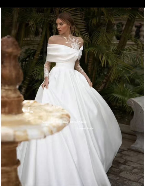 Load image into Gallery viewer, Raglan Sleeve Long Sleeve White Tutu Skirt Satin Wedding Dress
