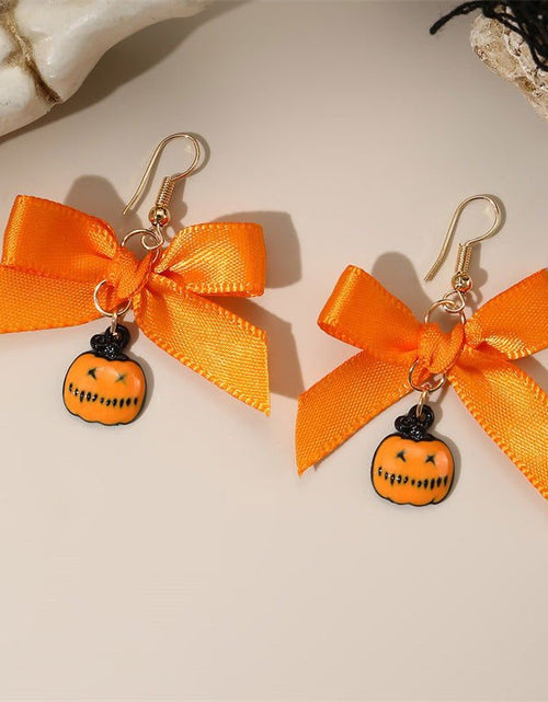 Load image into Gallery viewer, Bowknot Ribbon Pumpkin Head Earrings Halloween Female Accessories 2668south
