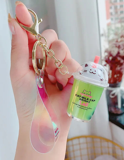 Load image into Gallery viewer, Creative Floating Unicorn Milk Tea Cup Bottle Keychain Cute Fruit Daisy Cat Bubble Tea Quicksand Sequins Liquid Car Keys Chain 2668south
