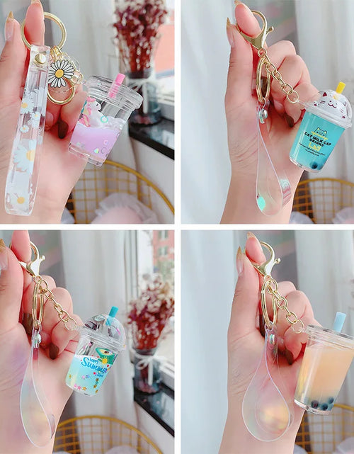 Load image into Gallery viewer, Creative Floating Unicorn Milk Tea Cup Bottle Keychain Cute Fruit Daisy Cat Bubble Tea Quicksand Sequins Liquid Car Keys Chain 2668south
