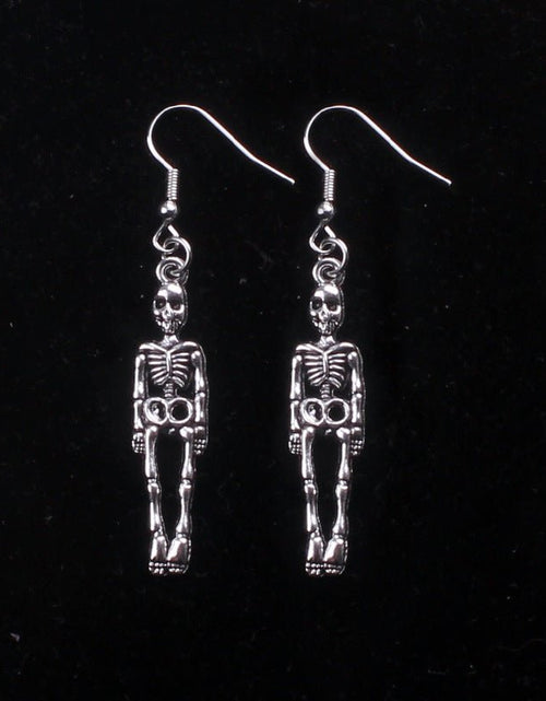 Load image into Gallery viewer, European And American Popular Exaggerated Gothic Skull Earrings 2668south
