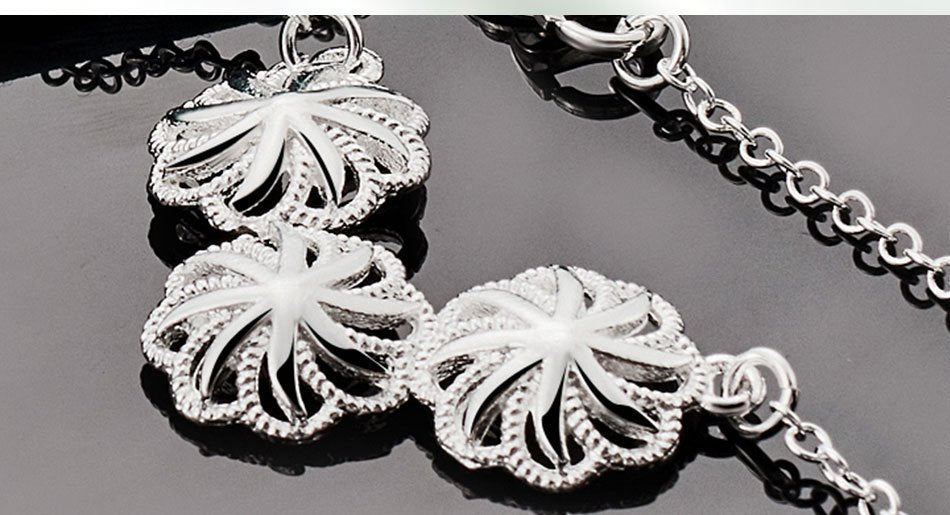 Silver Flower-shaped Hollow Pendant Necklace For Women 2668south