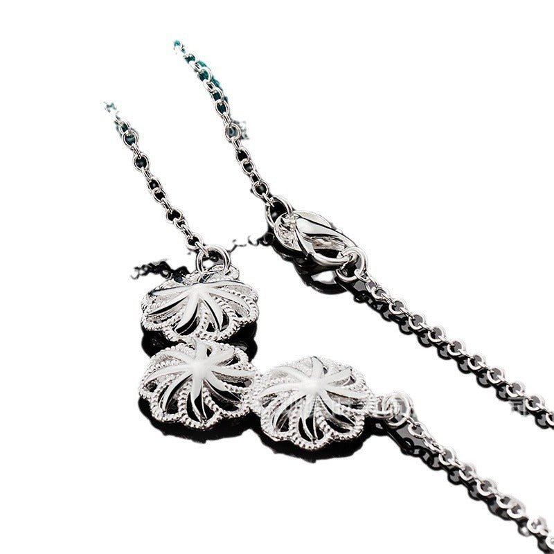 Silver Flower-shaped Hollow Pendant Necklace For Women 2668south