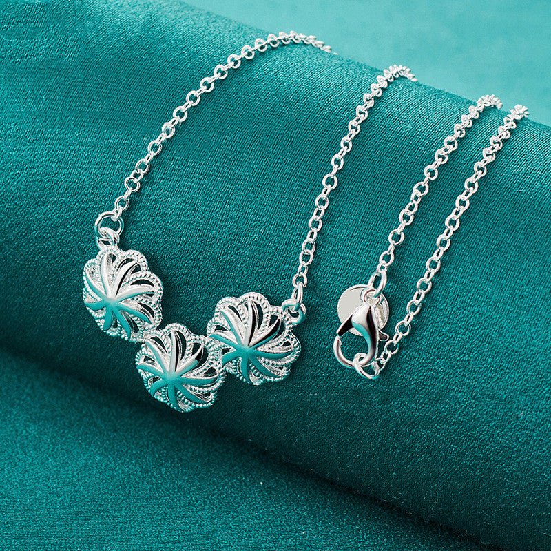 Silver Flower-shaped Hollow Pendant Necklace For Women 2668south